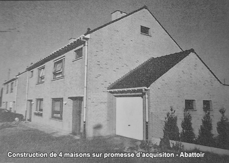 Défilement de vieilles photos des logements construits ou en train d'être construit par la SLM période 2000-2014 Photo construction de 4 maisons sur promesse d'acquisition - Quartier Abattoir